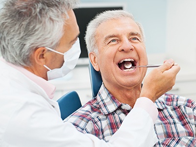 man receiving dental check-up